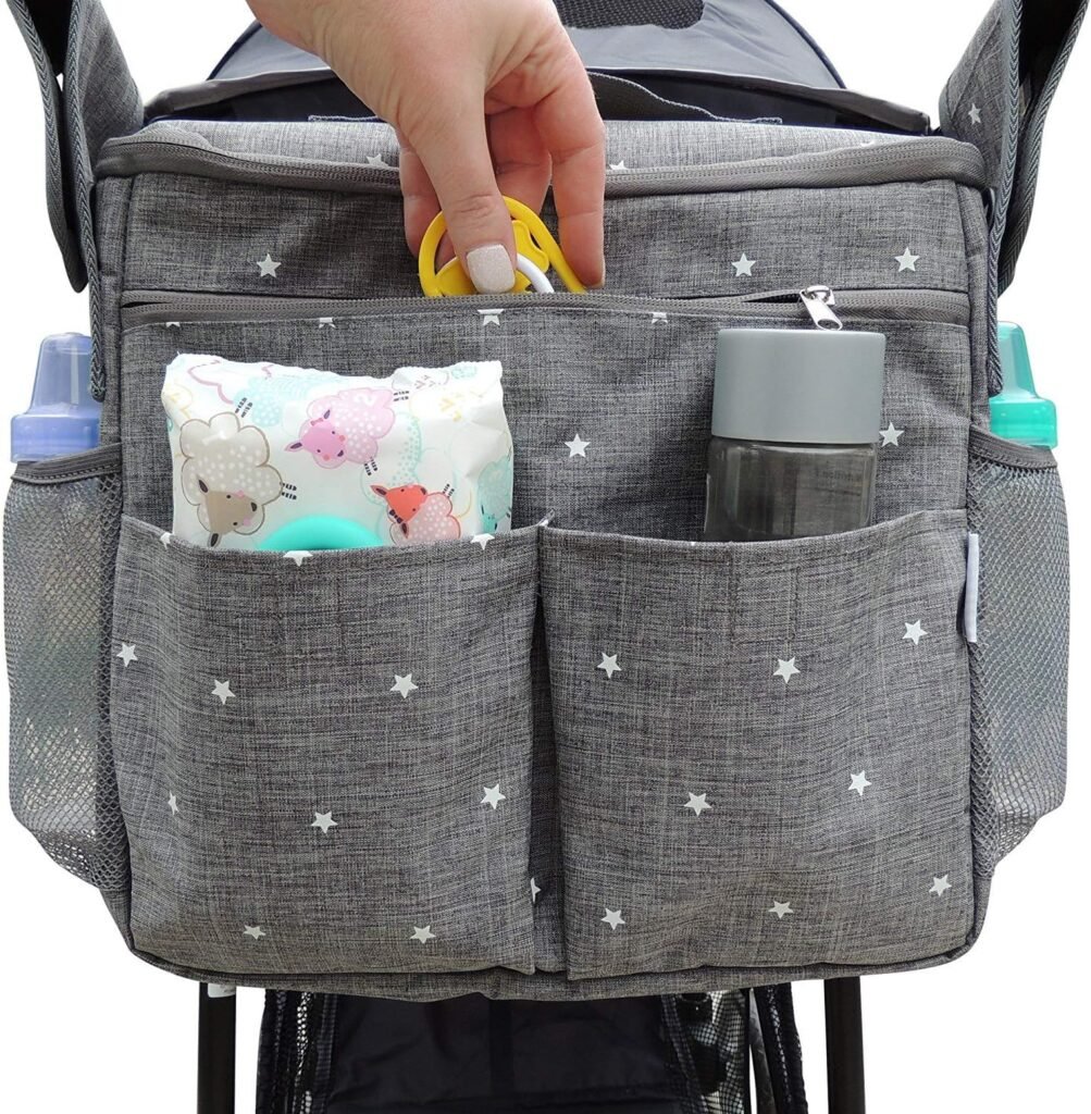 Go-Go Universal Stroller Organizer Bag by Goodstuffshop. Large Insulated Parent Console with Cup Holder and Extra Storage Pockets. Universal Design - Attaches to Any Stroller. Easy Installation. Go-Go Universal Stroller Organizer Bag by Goodstuffshop. Large Insulated Parent Console with Cup Holder and Extra Storage Pockets. Universal Design - Attaches to Any Stroller. Easy Installation.